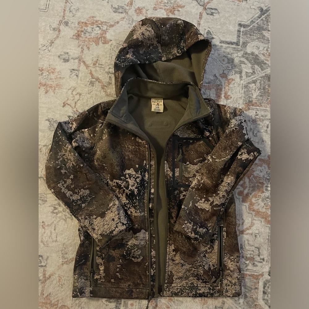 Redhead Youth Camouflage Jacket. Size large.